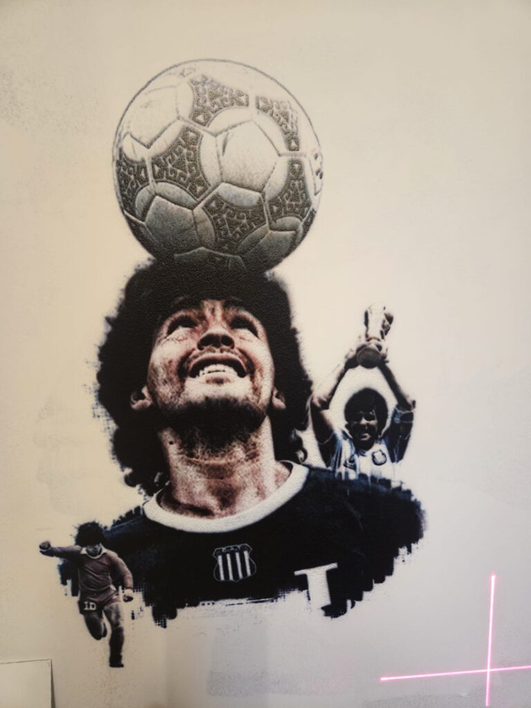 Maradona Holding a Ball with it's head - Don General CH